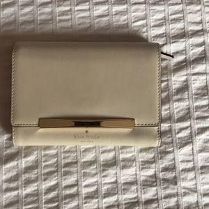 Kate Spade tan wallet with gold detail